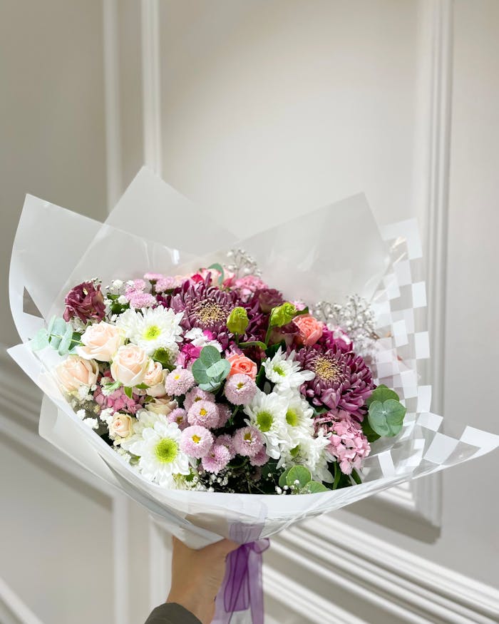 Stunning bouquet of mixed flowers, perfect for celebrations and gifts.
